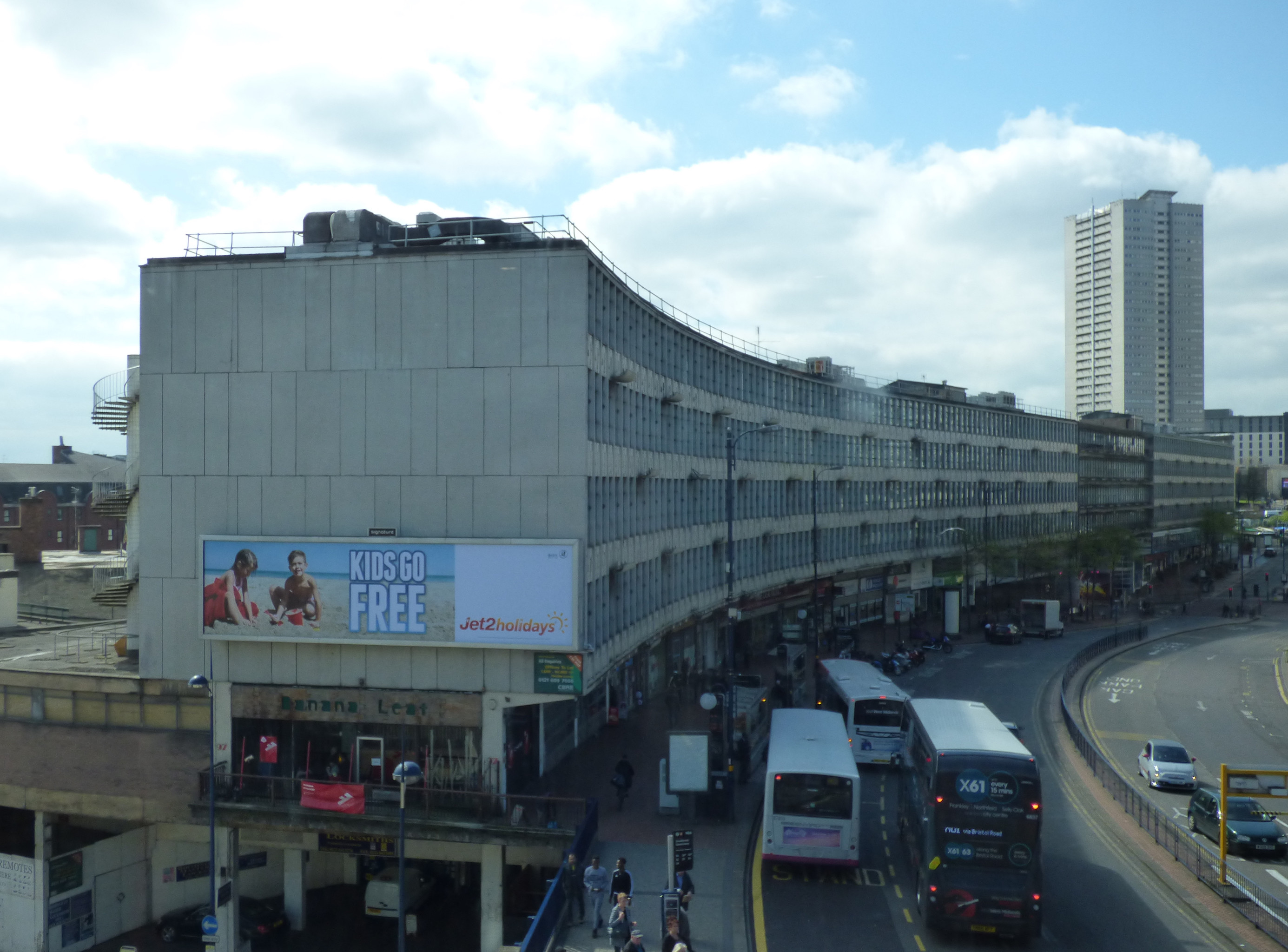 Wide exterior shot of the Ringway Centre, a large curved building in Birmingham, in 2017