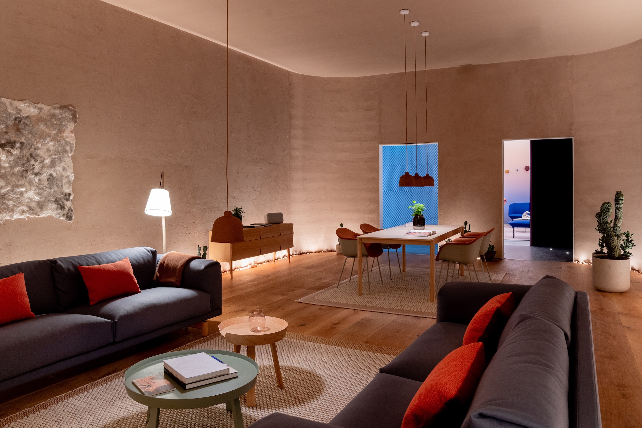 Dimly lit living room at 2019 Milan Design Week developed by Google’s Ivy Ross, Muuto’s Christian Grosen, and Reddymade’s Suchi Reddy
