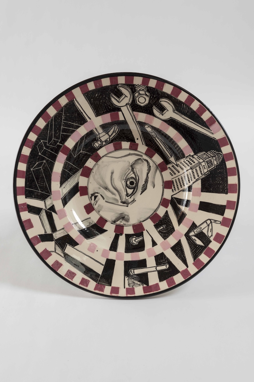 Ceramic dish by Peter Shire with illustration of eye in the middle