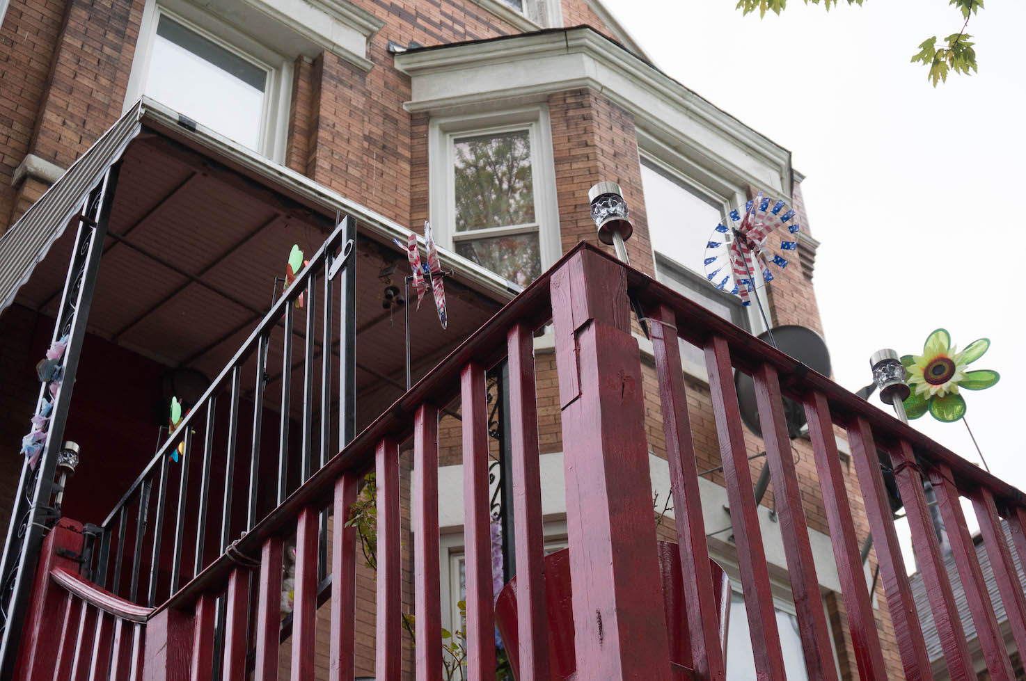 A red deck with pinwheels on it. 