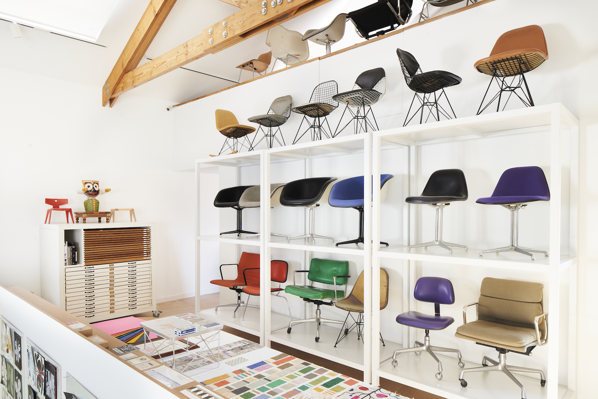 Chairs on a shelf in a spare room