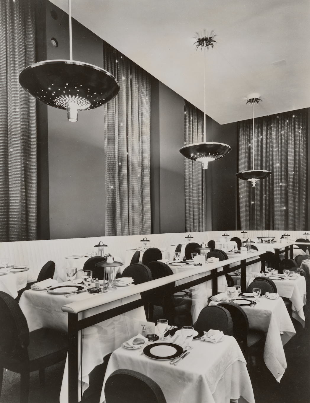 black and white photograph of elegant restaurant dining room