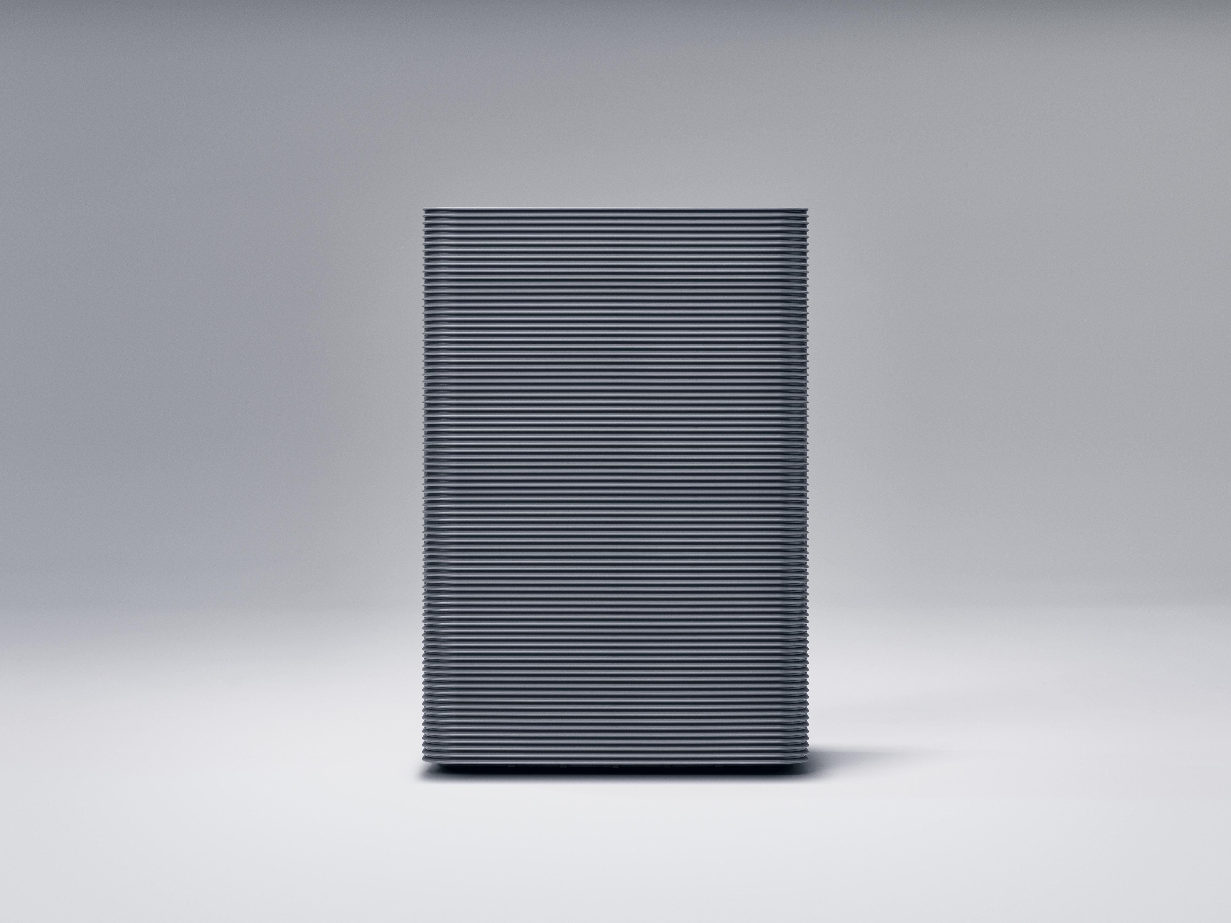 Naoto Fukasawa's dark gray rectangular minimalist air purifier