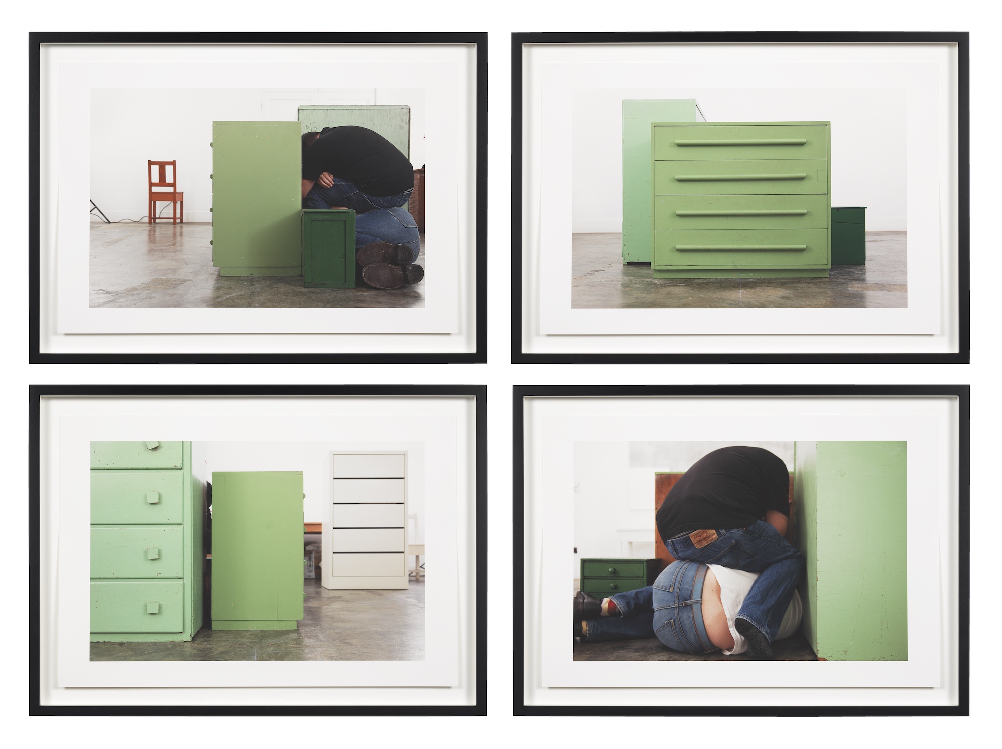 four framed photos focused on a green dresser, and in two of them one man is sitting curled up on top of another