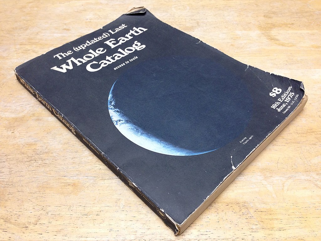 1975 dark blue issue of the Whole Earth Catalog with a crescent moon on the cover